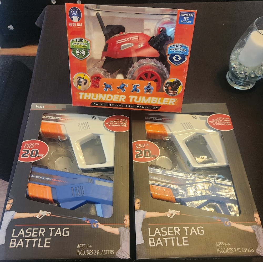 2 sets of laser tag guns and 1 remote controlled car